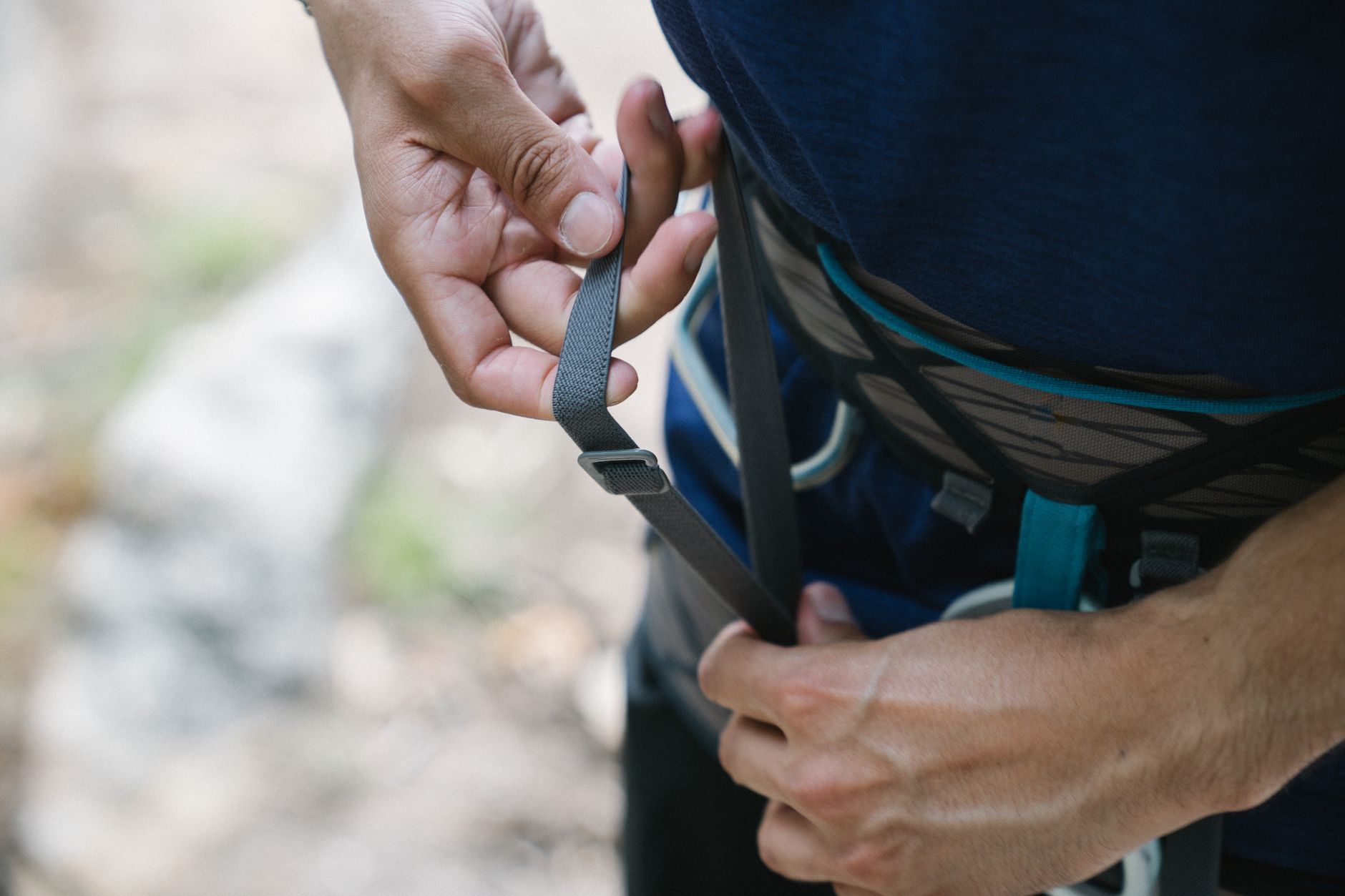 close-up of a maternity climbing harness with adjustable straps and a soft waistband