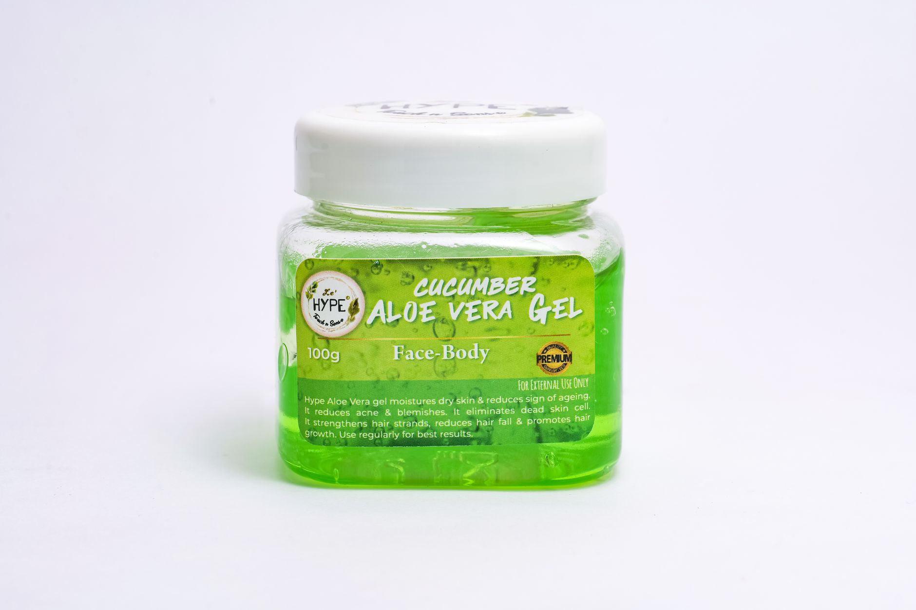 A collection of pregnancy‑safe skincare products on a vanity: a jar of petroleum jelly, a small bottle of coconut oil, a tub of shea butter, and a glass of aloe vera gel, soft natural lighting highlighting the gentle textures