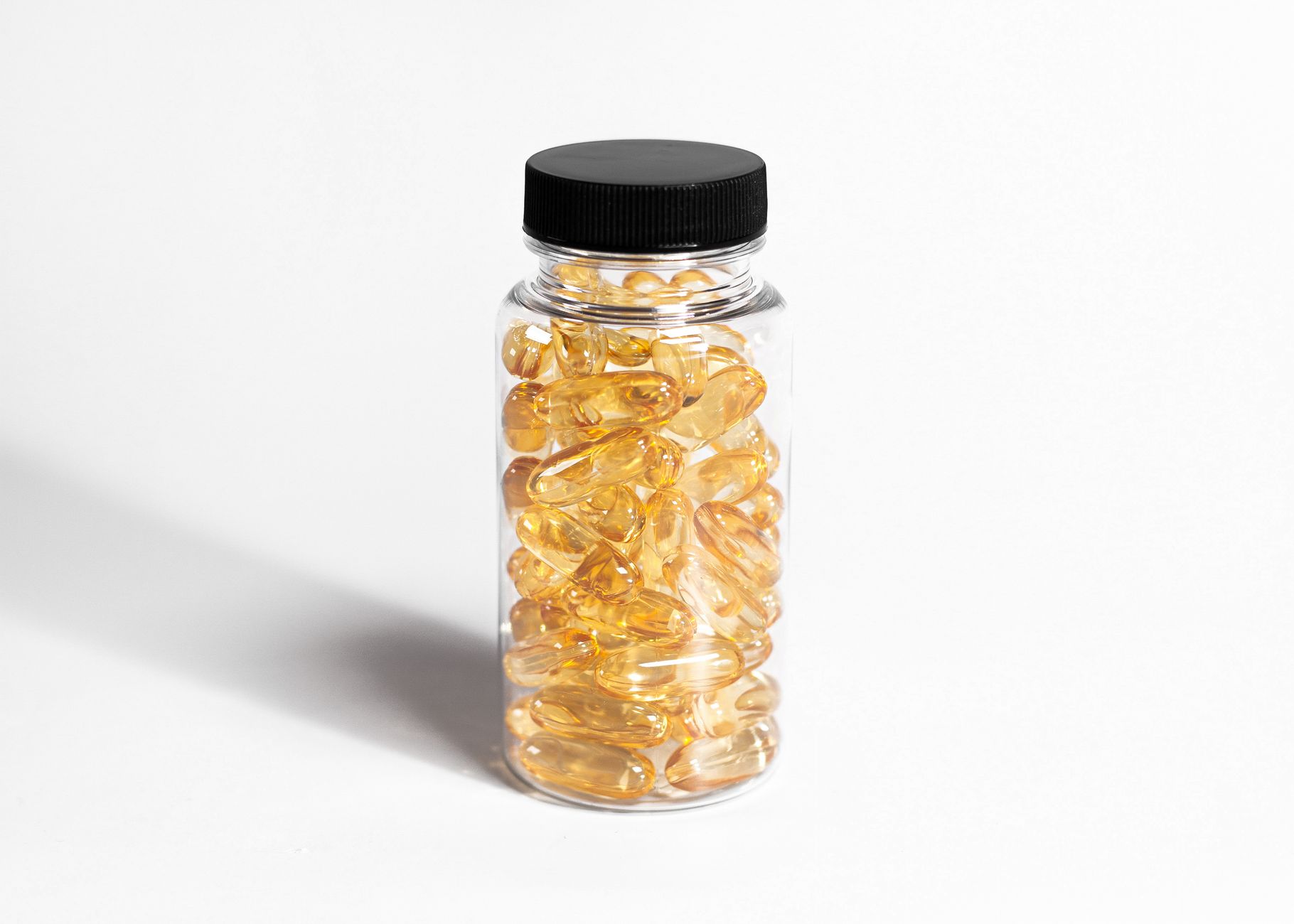 close‑up of a supplement label on a white background, highlighting the ingredients list, dosage information, and third‑party testing logo for a propolis capsule product
