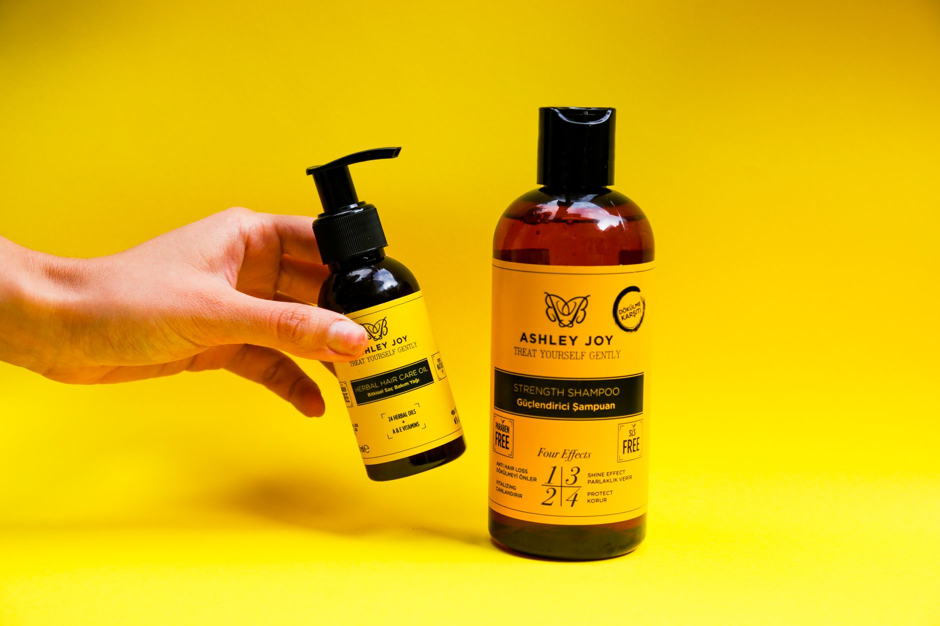 Close‑up of a shampoo bottle label showing ingredient list, highlighting surfactants, preservatives, and fragrance‑free symbols for a pregnant consumer