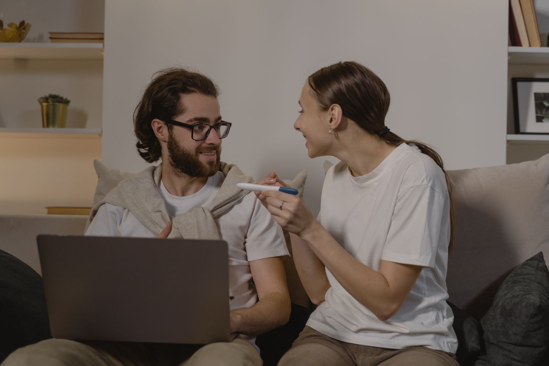 Genetic counselor discussing test results with a couple.