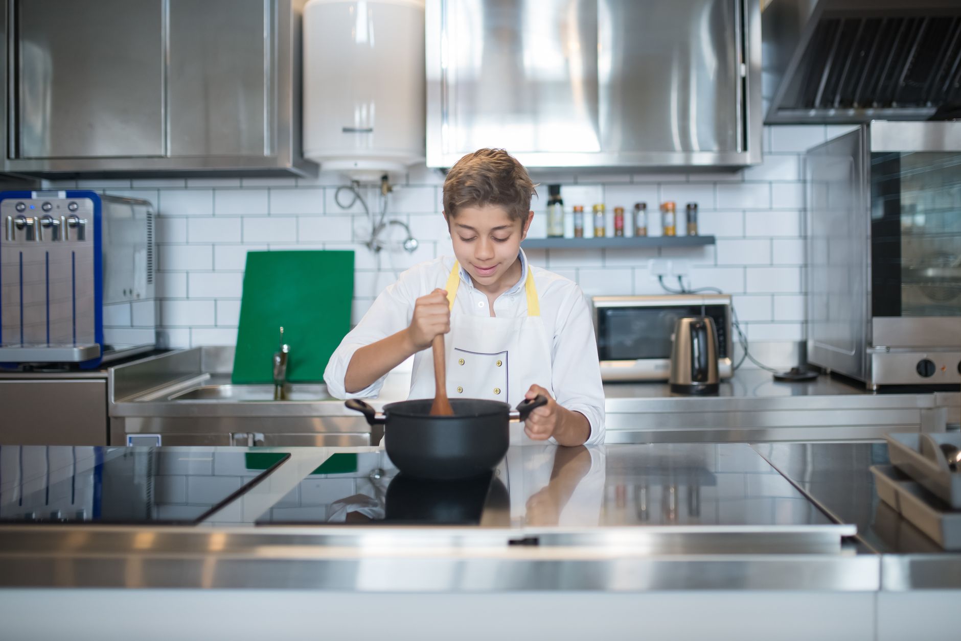 Child helping with meal prep