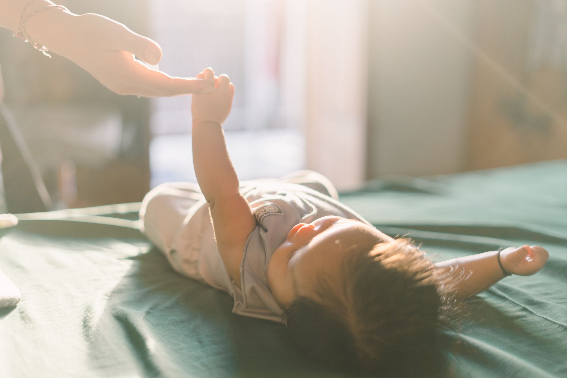 Parent comforting toddler during night terror