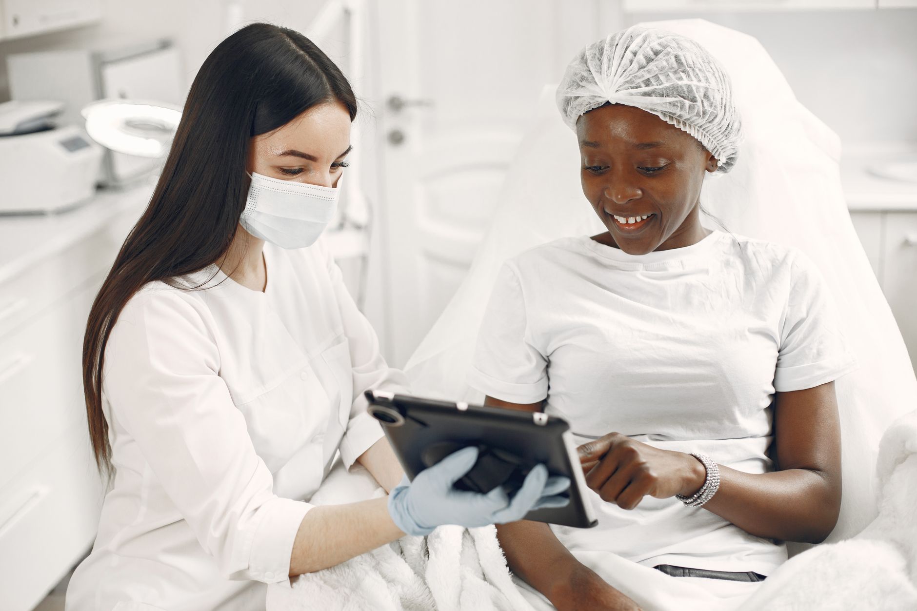 Lesbian couple consulting with fertility specialist