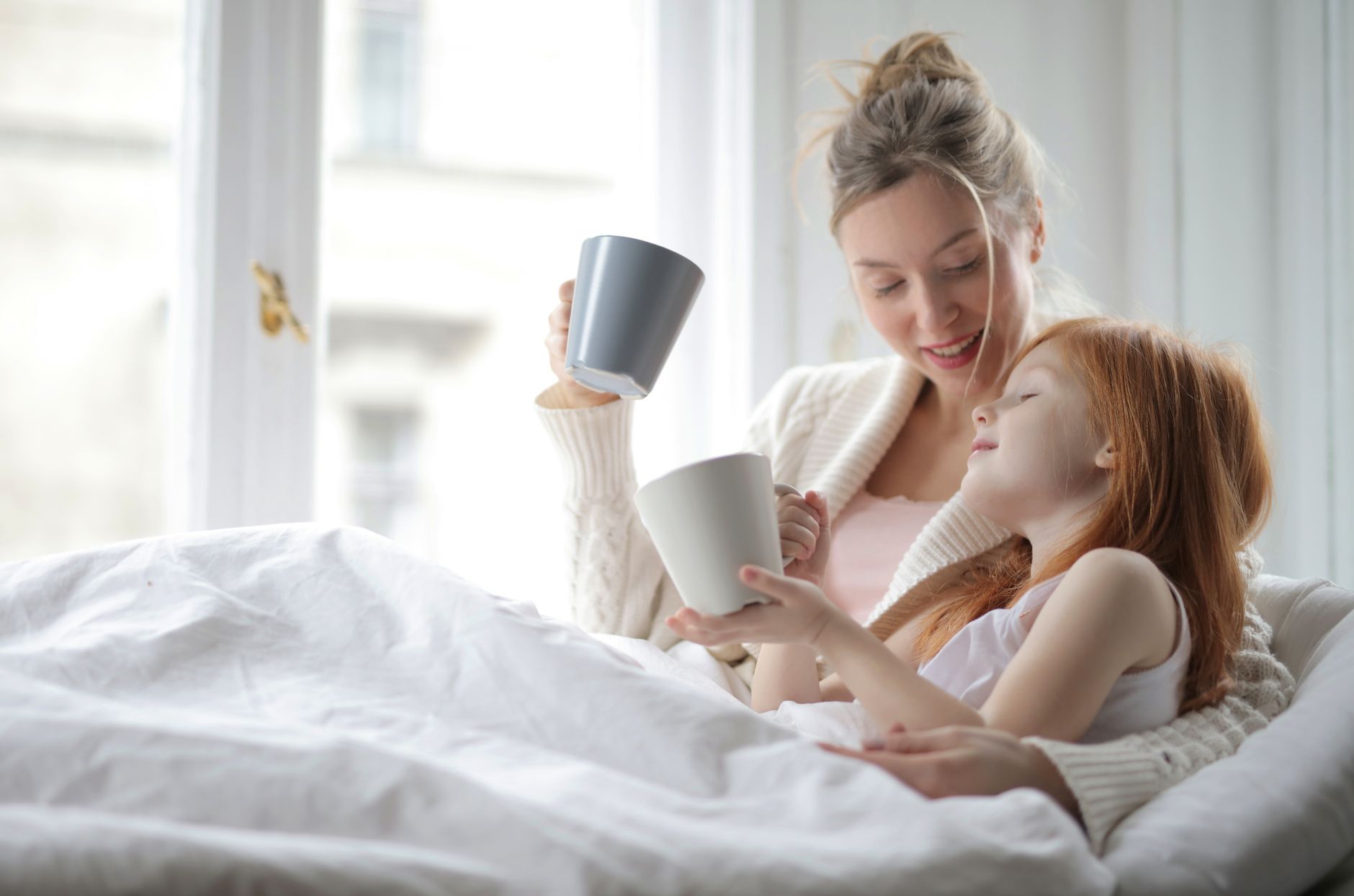 Mothers in a support group sharing experiences.