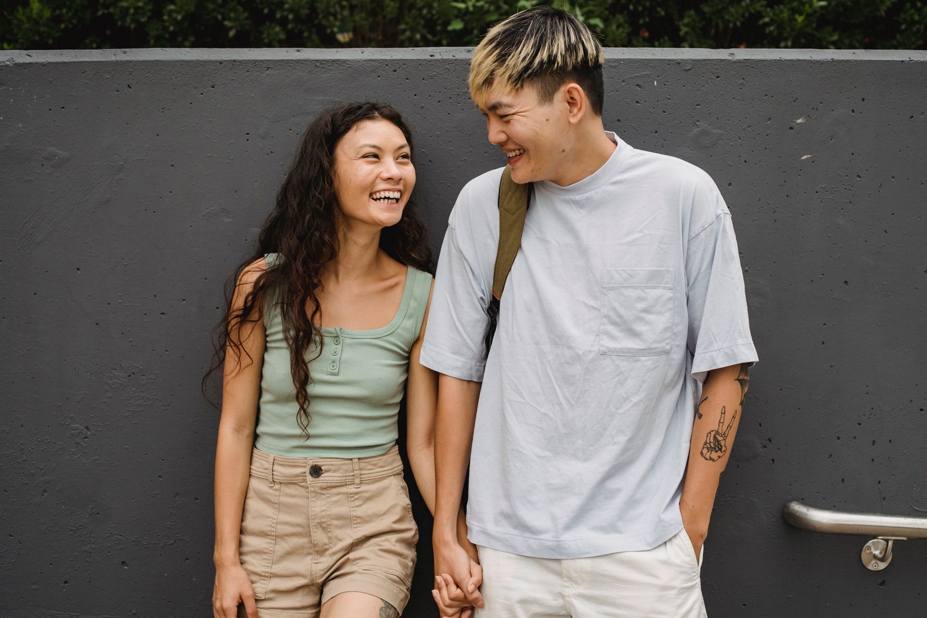 Couple laughing during pregnancy