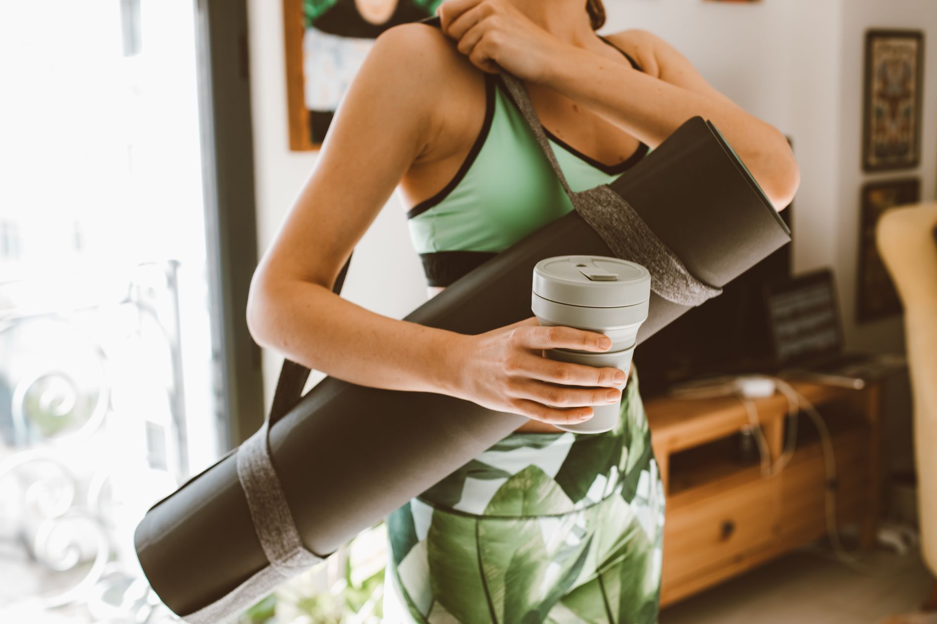 Woman practicing prenatal yoga and journaling