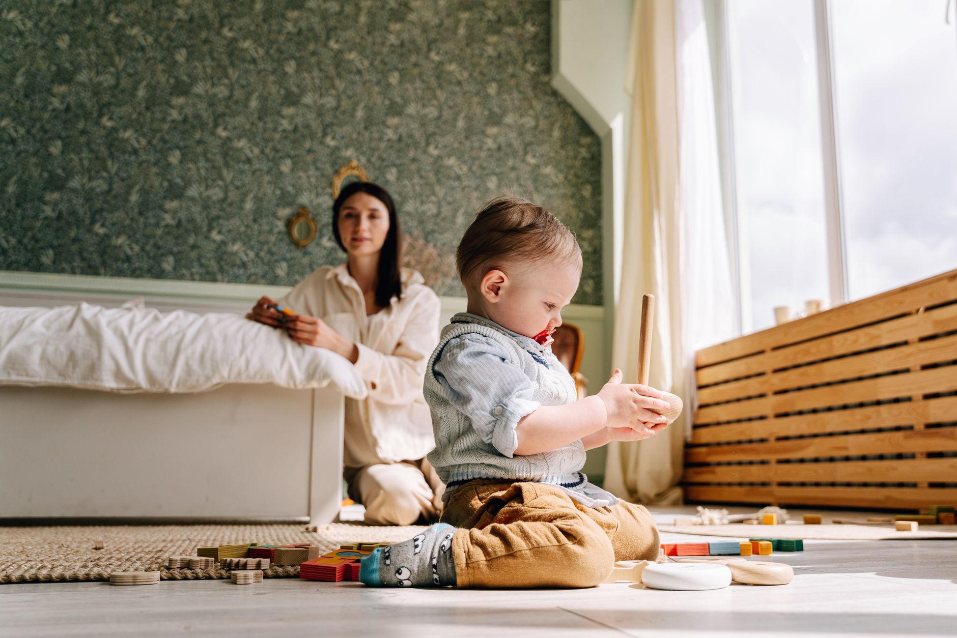 Family room with toddler and baby
