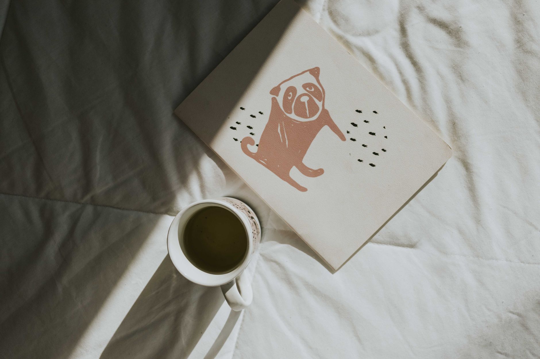 Bedroom with blackout curtains and journal