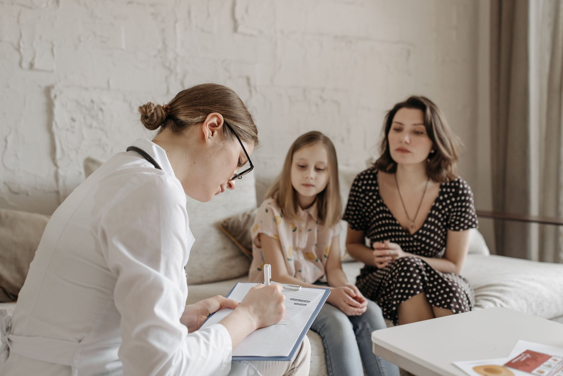 Parent discussing vitamin K with doctor