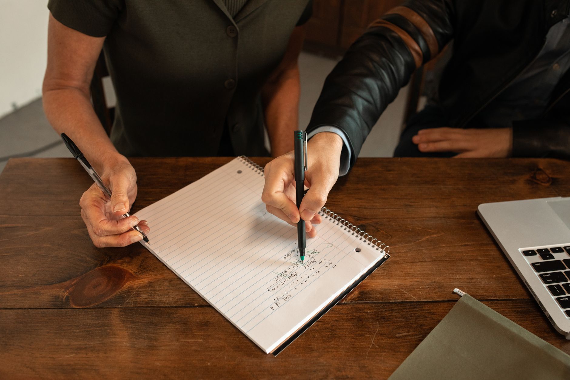 Couple brainstorming baby names together