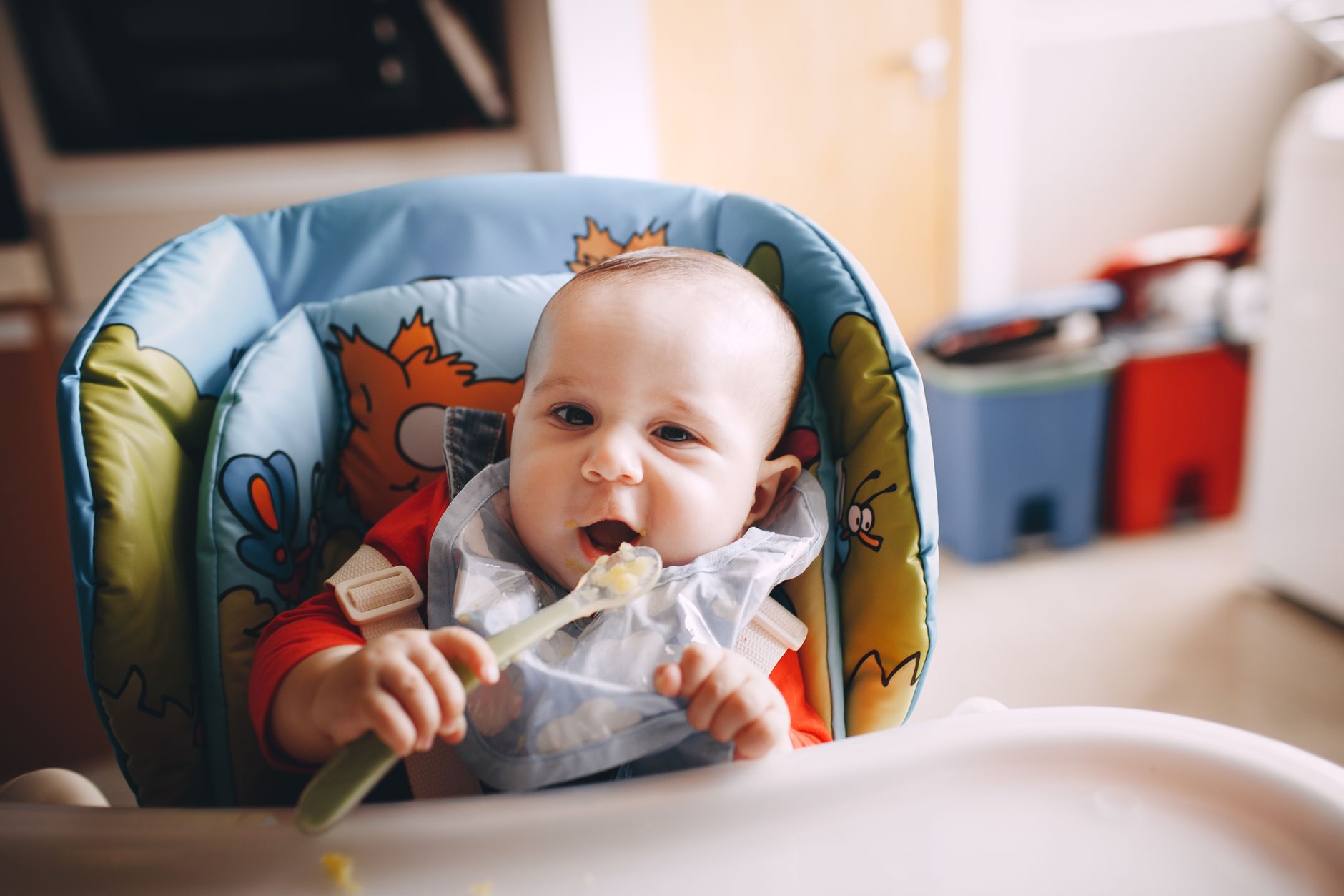 Toddler eating honey‑sweetened oatmeal