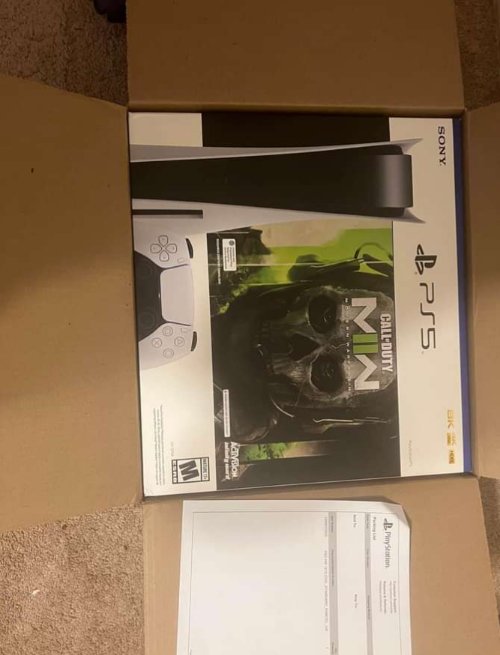 Good condition Sony PS5, white in color, with the controllers