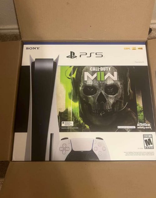 Good condition Sony PS5, white in color, with the controllers