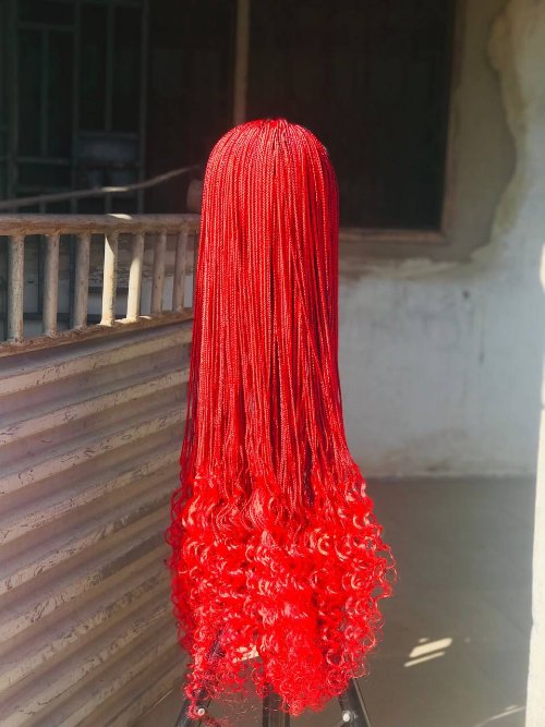 Frontal braided wig with french curls .