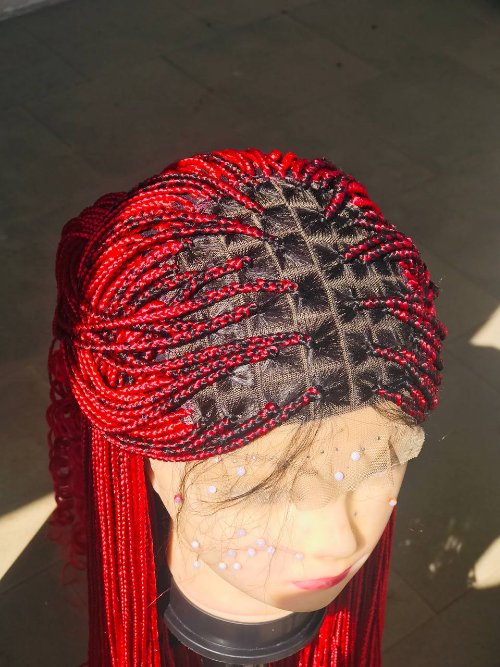 Frontal braided wig with french curls .