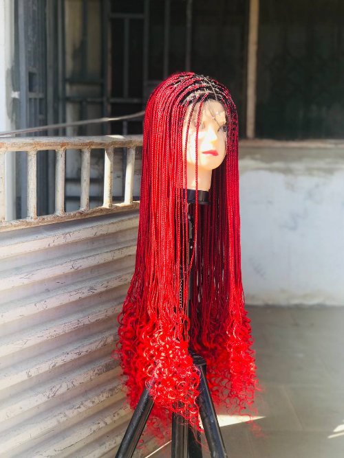 Frontal braided wig with french curls .