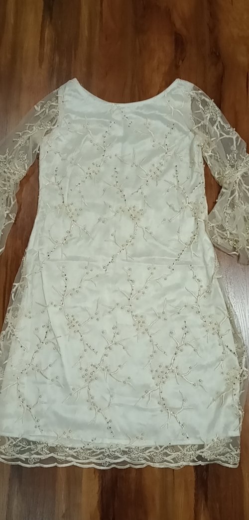One piece White in color Boutique piece
