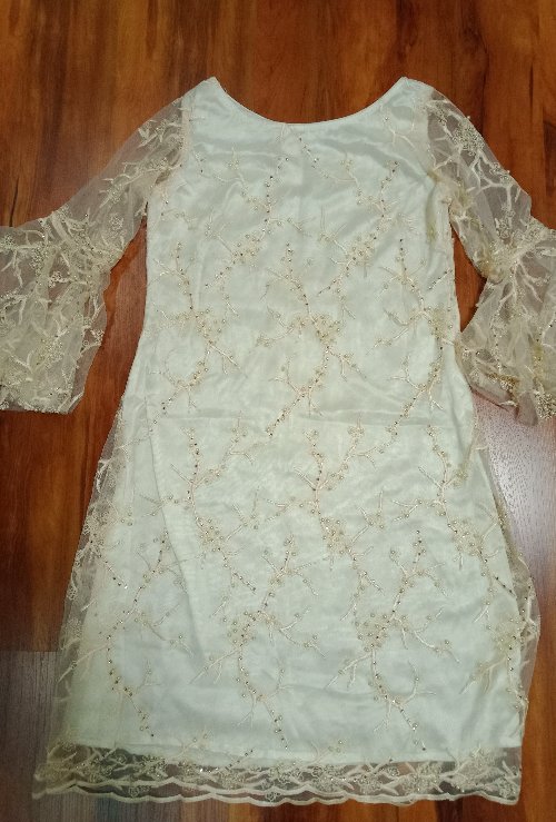 One piece White in color Boutique piece