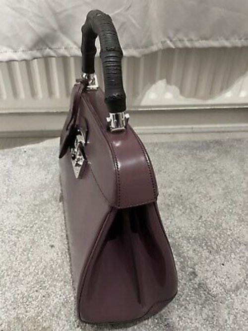 gucci bag women. Featuring the iconic Lady Lock, this top