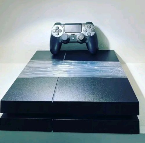 PS4 Slim 500go Neuf 10/10 Craquer avec 15 jeux Fifa23