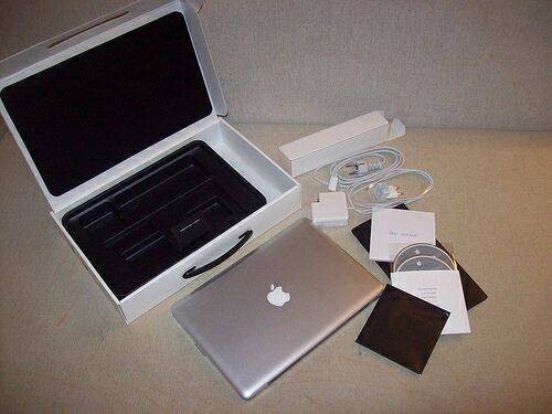 Brand new touch screen enabled apple laptop and an apple