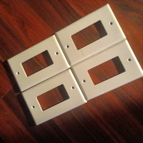 4pcs outlet covers or Light switch covers.