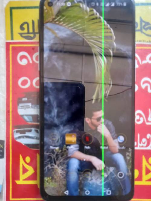 একটা গ্রীন লাইন আর বেক শেল টা একটু ফাটা ক্যামেরা