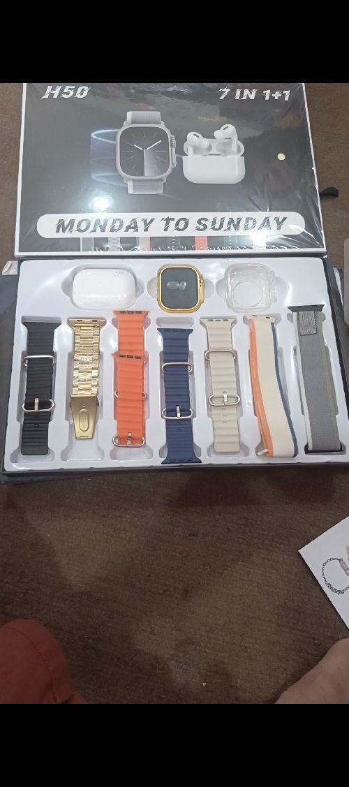 Golden Smart watch with seven straps and earbuds