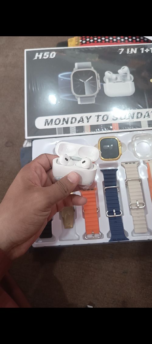 Golden Smart watch with seven straps and earbuds