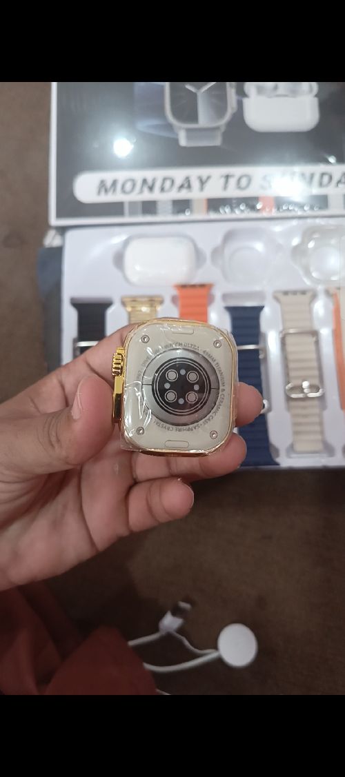Golden Smart watch with seven straps and earbuds