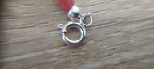 Collana in corallo rosso a cannettine, montata in argento 925