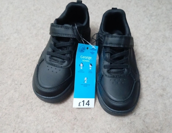 Black school shoes, new with tags, never worn, selling for