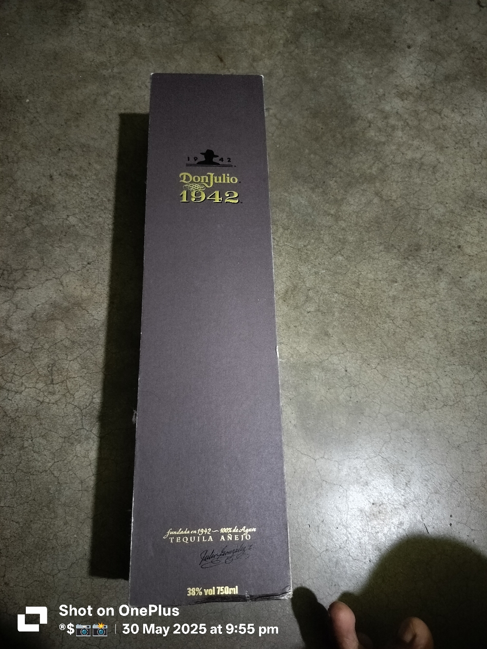 Empty donjulio 1942 bottle with box