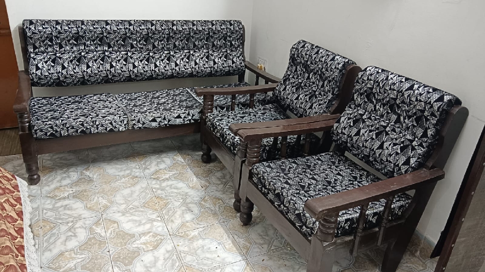 Five seater sofa set with coffee table good condition one