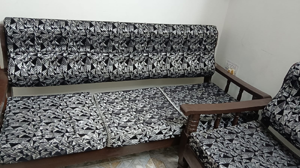 Five seater sofa set with coffee table good condition one