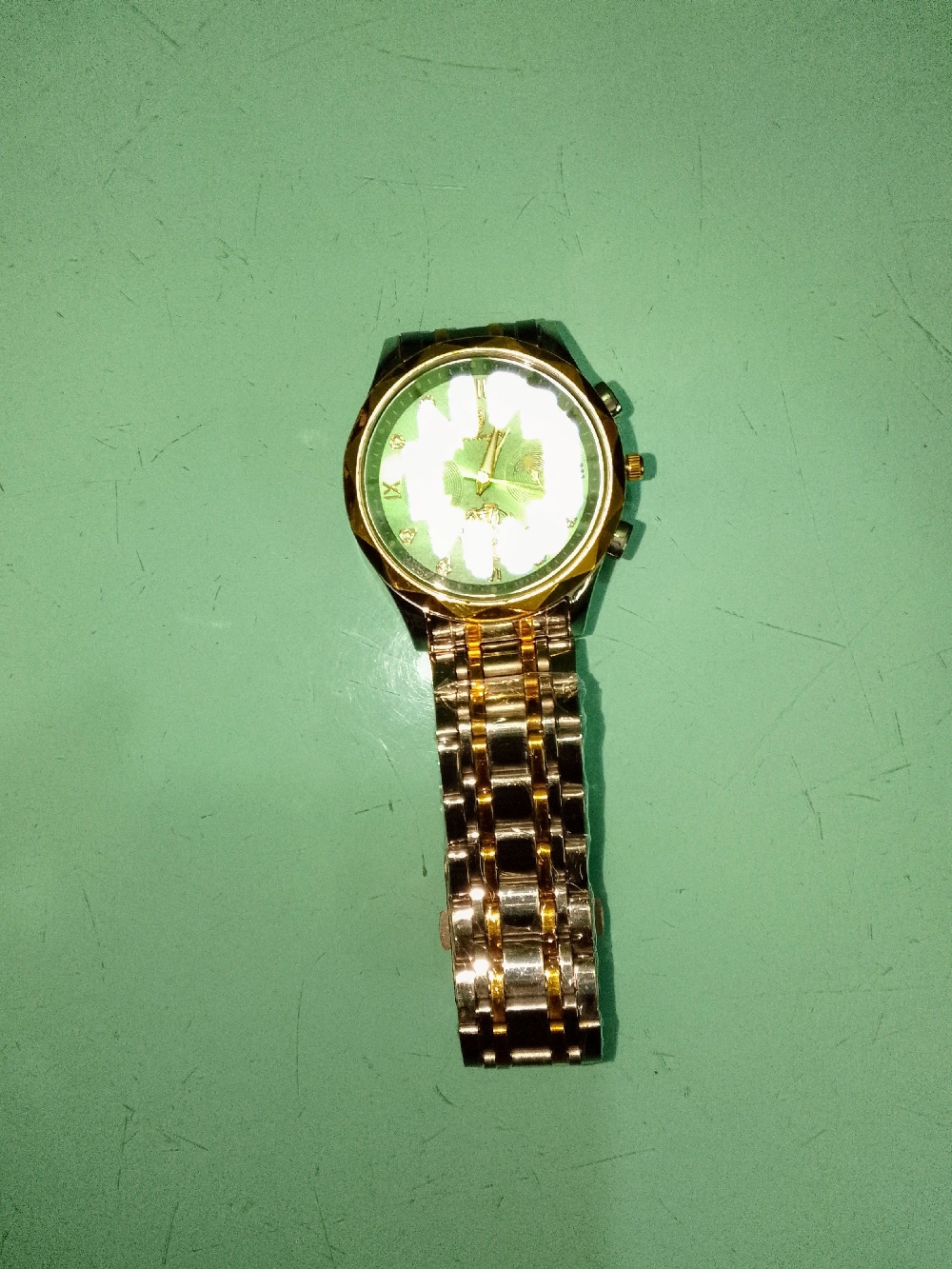 Watch name : POEDAGAR. Colour : golden and white. Quality
