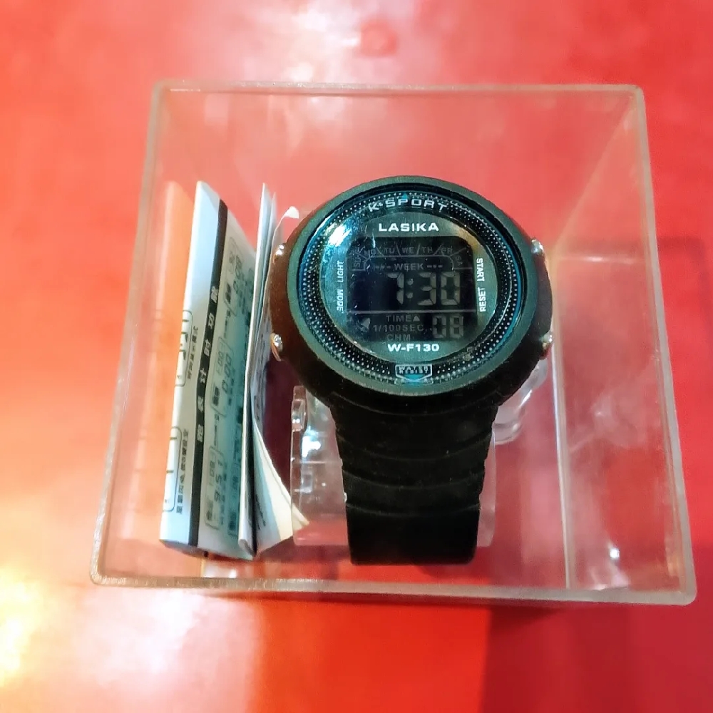 Watch name : LASIKA Digital watch. Colour : black Quality