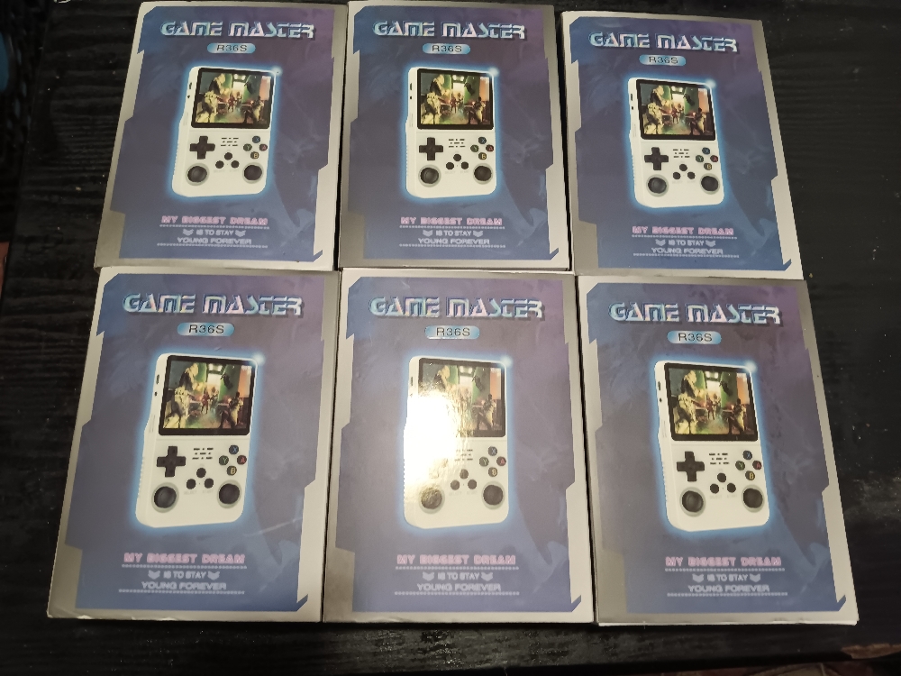 GAME MASTER RETRO CLASSIC GAMING HANDHELD WITH OVER 35,000 GAMES
