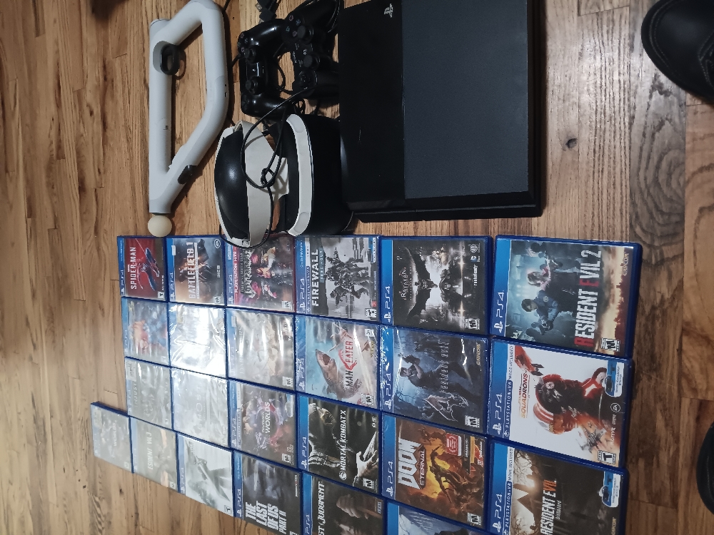 PLAYSTATION 4 BUNDLE COMES WITH GAMES NEW AND USED CONTROLLER