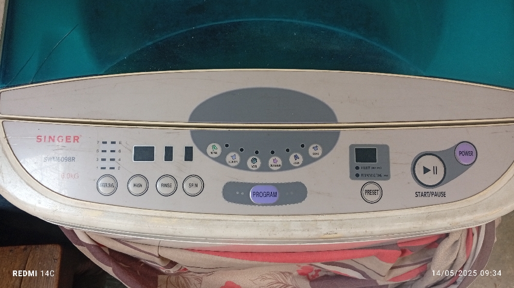 Singer washing machine Model SMW6098R Capacity.6kg Condition. Using 3years but