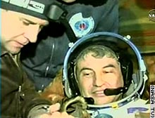 Capsule returns to Earth from space station