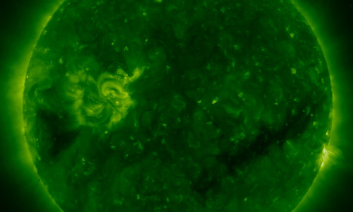 green image of sun by STEREO, credit: NASA