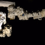 Two robot arms and one spacewalker. on Twitpic