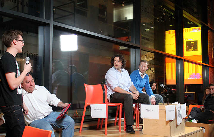 Louis Stupple-Harris (UCL iGEM 2011), with panelist Dr Joe Cain (UCL), Dr Brendan Clarke (UCL) and Howard Boland (C-LAB)