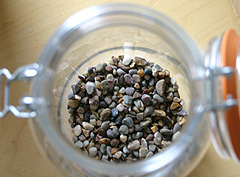 &copy; c-lab 2005, gravel in glass container top view