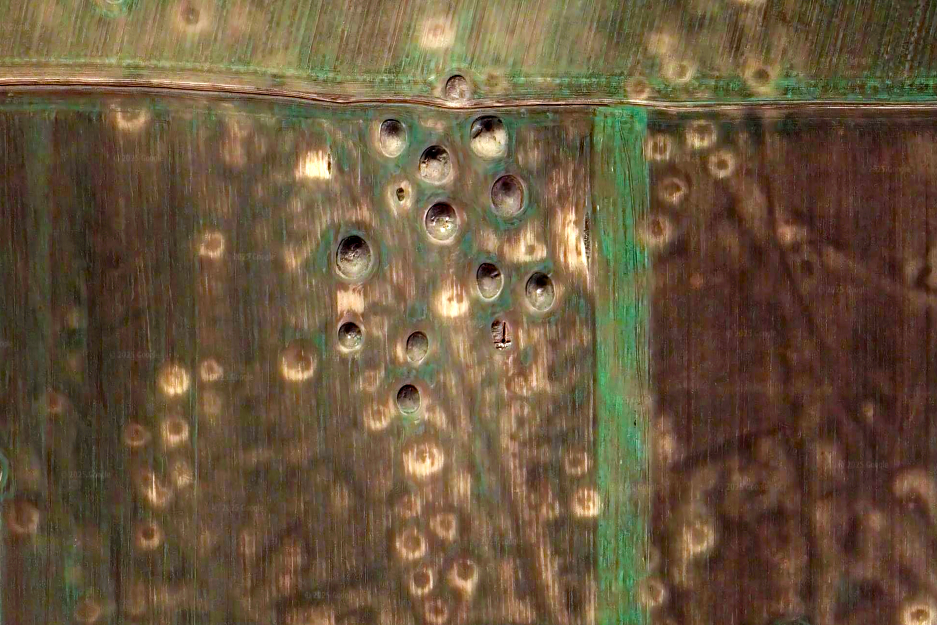 Satellite view of kurgans within agricultural fields near Istria, Romania. Image © 2025 Google Earth