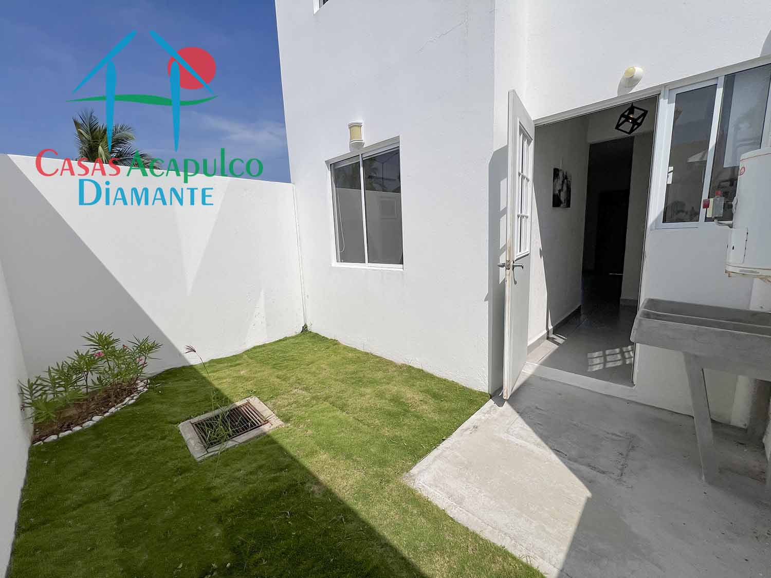 Puerta al sol casa muestra Ciprés - Patio 2