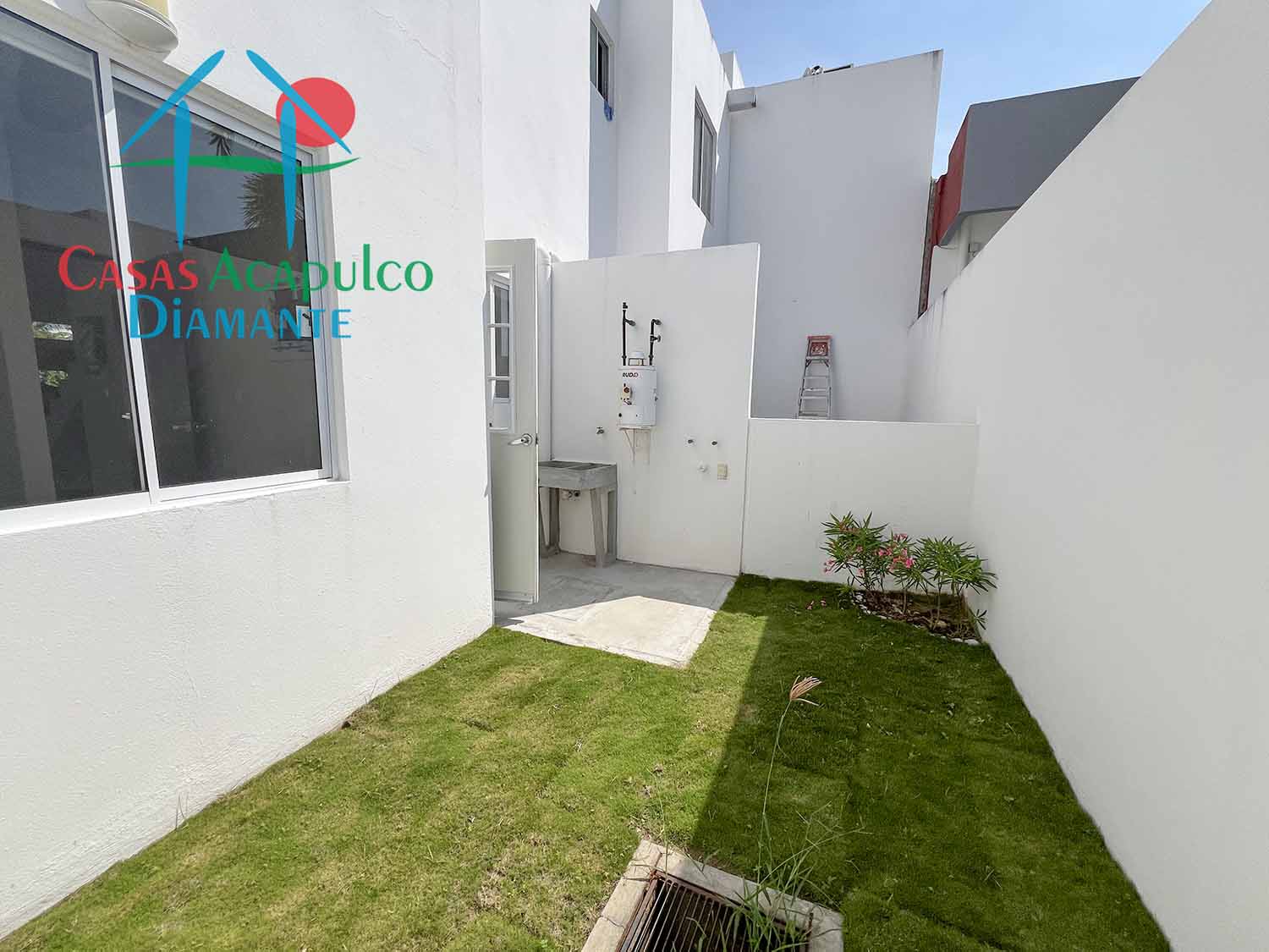 Puerta al sol casa muestra Ciprés - Patio 3