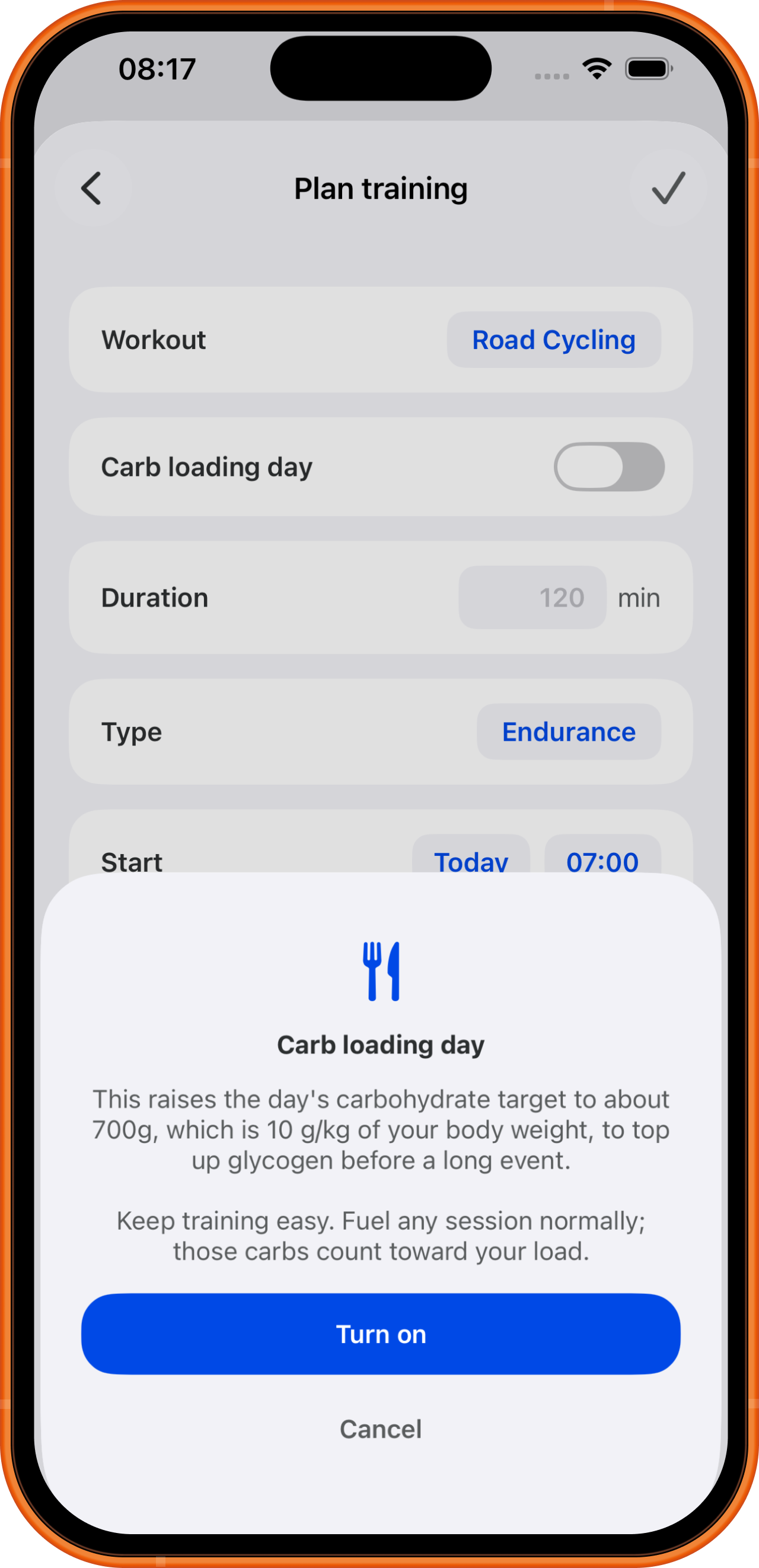 Plan training screen with the Carb loading day prompt, which raises the day's carb target to about 700 g, or 10 g/kg